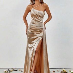 Asymmetrical neck, ruched gold satin formal dress. Good for wedding or prom.